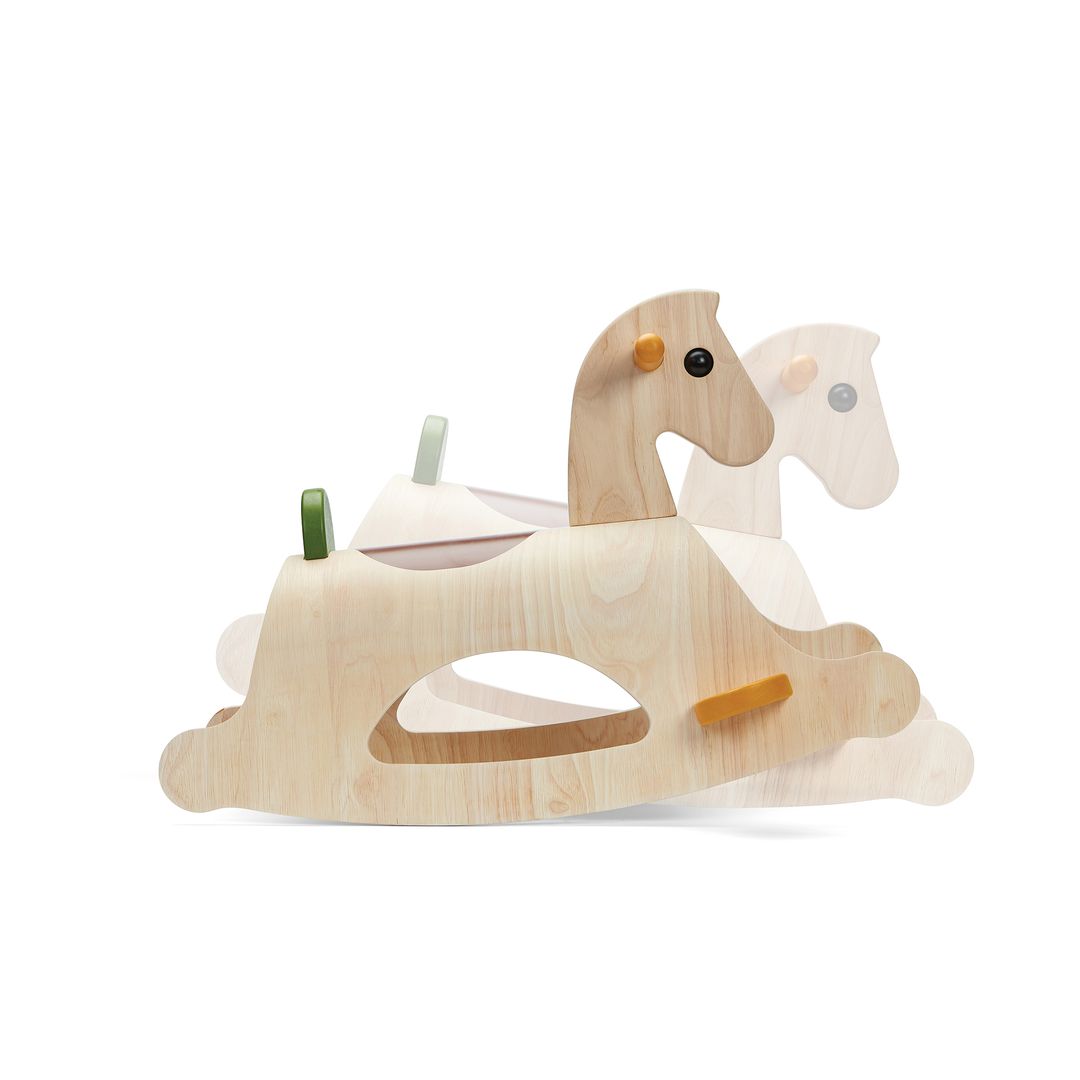 Child riding the PlanToys Palomino Modern Rustic