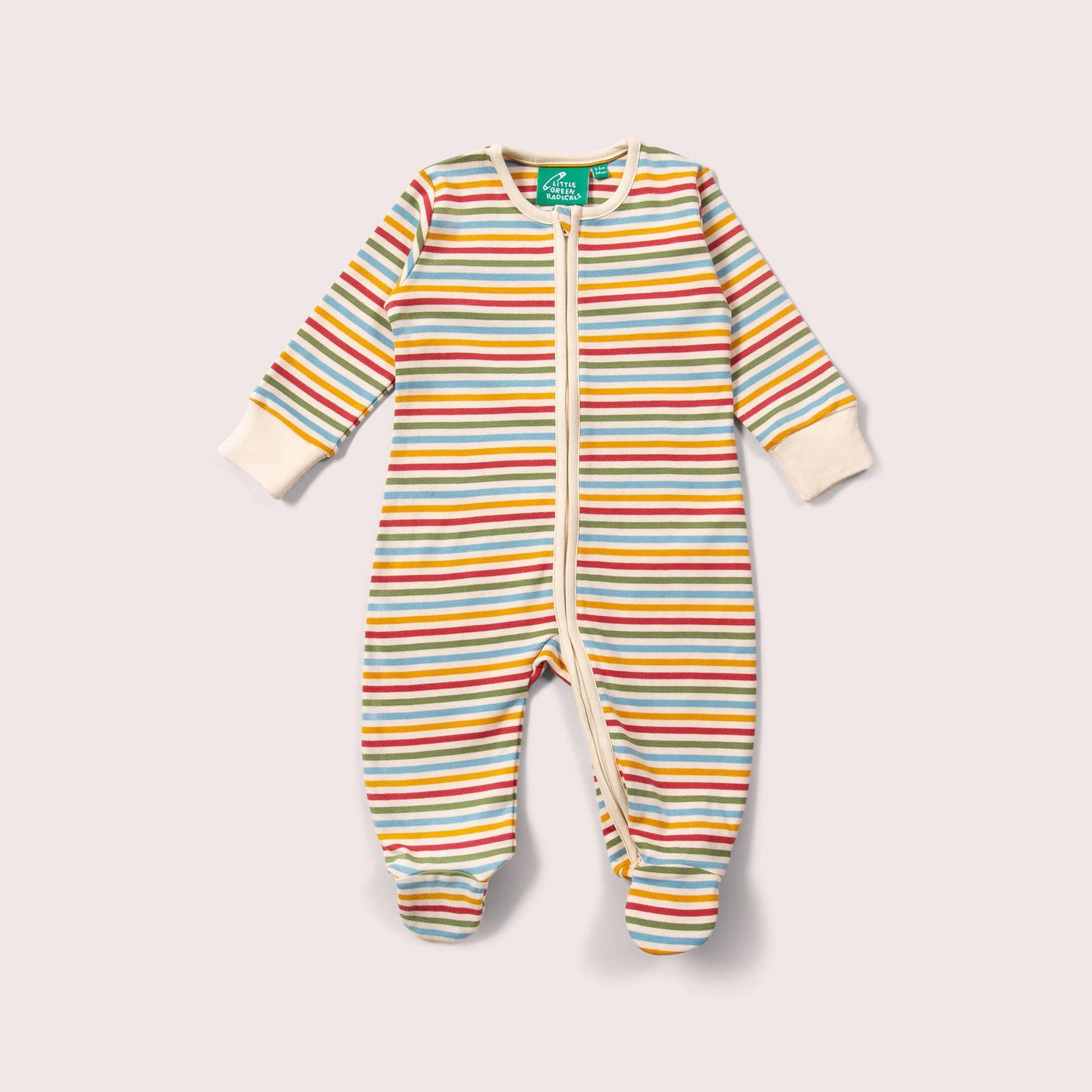 Striped baby romper with a cream and muted rainbow stripes a light gray background