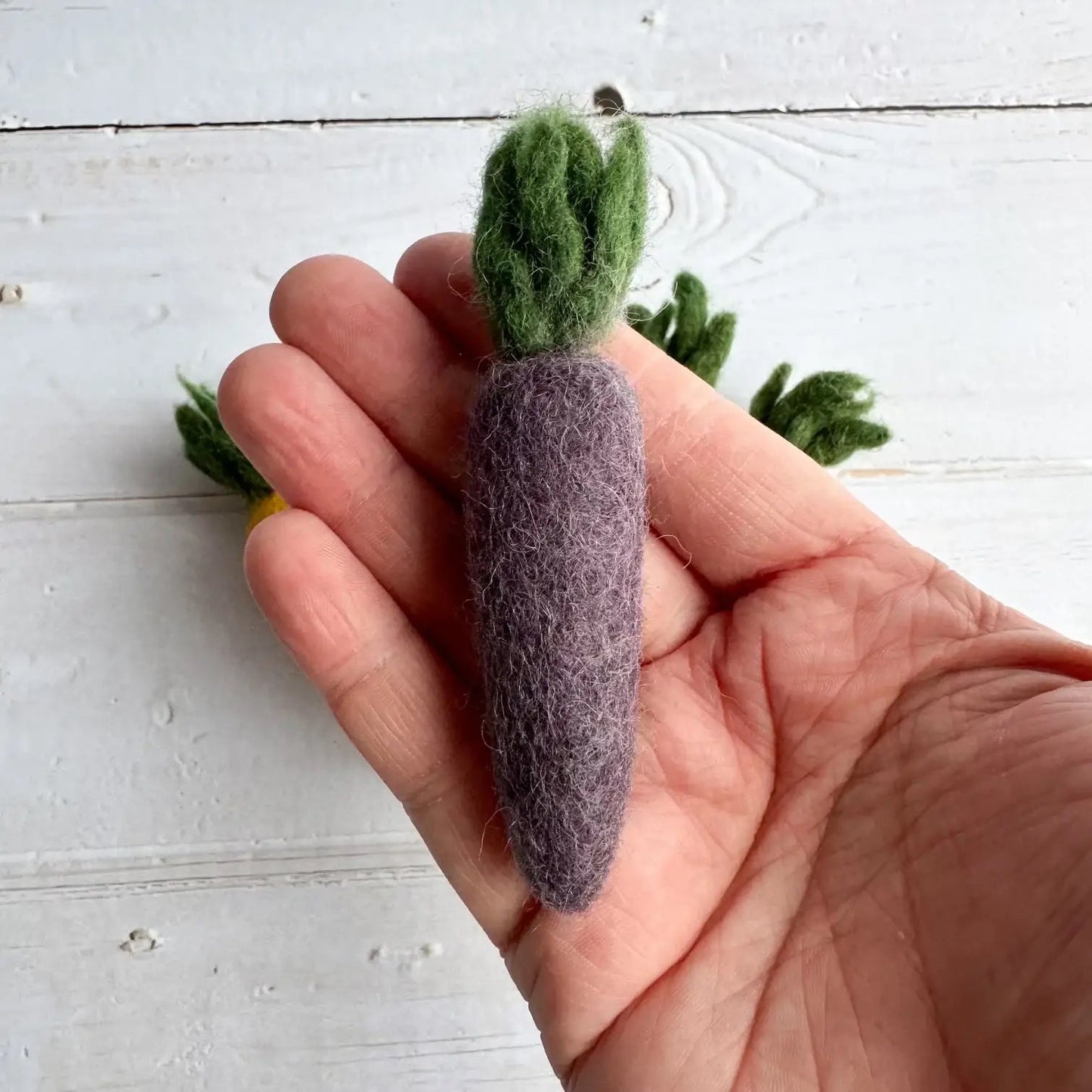 one felt purple carrot