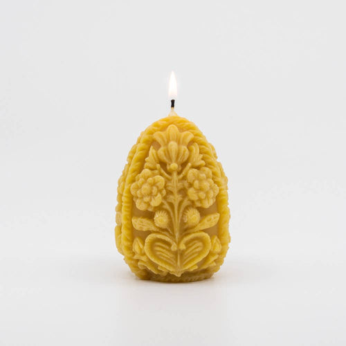 carved egg beeswax candle