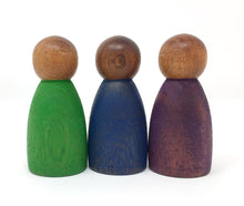 Load image into Gallery viewer, Three wooden peg people, one painted green, one blue, and one purple, from left to right
