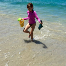 Load image into Gallery viewer, Child walking in the water holding bamboo sand bucket and play set
