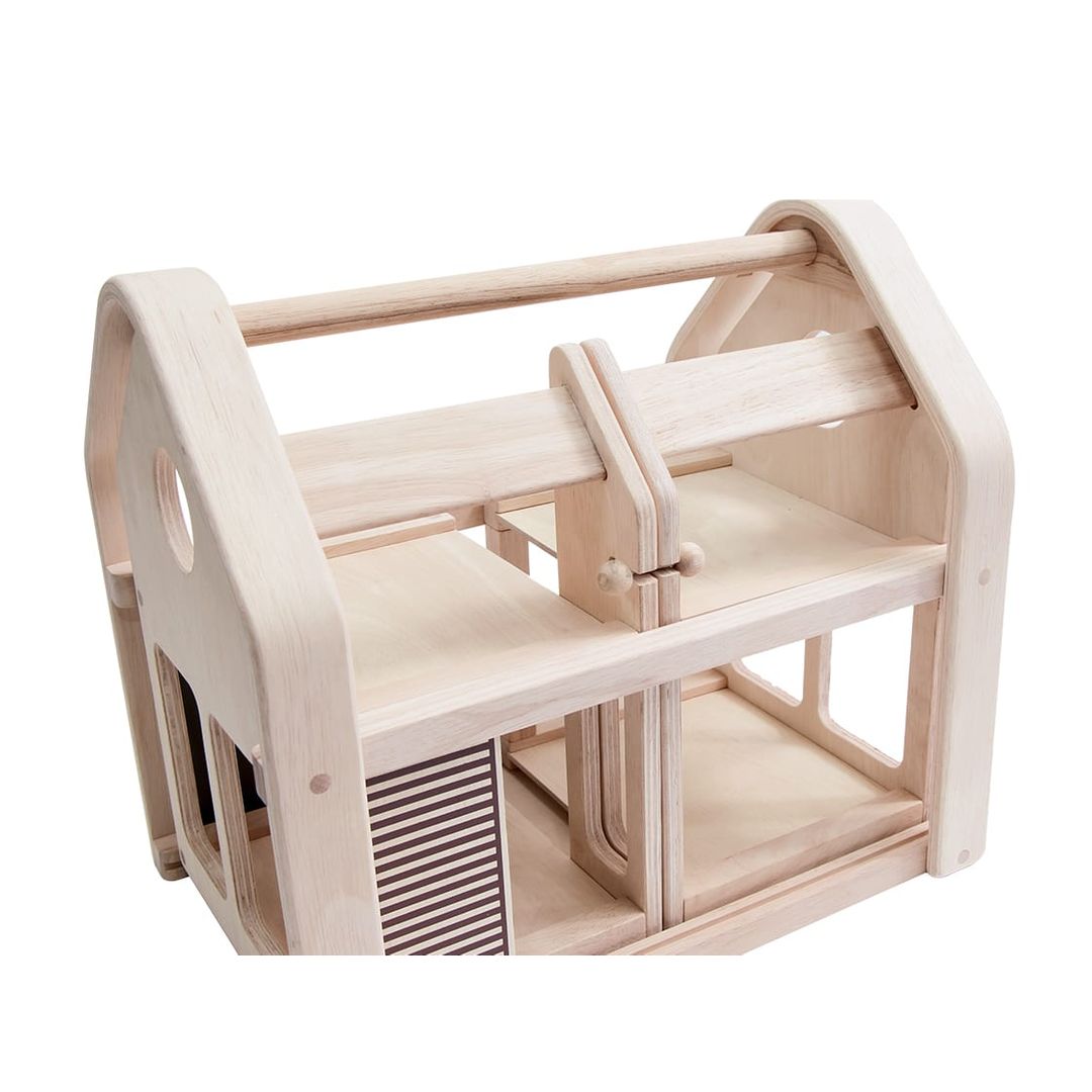 Slide N Go Doll house by Plan Toys
