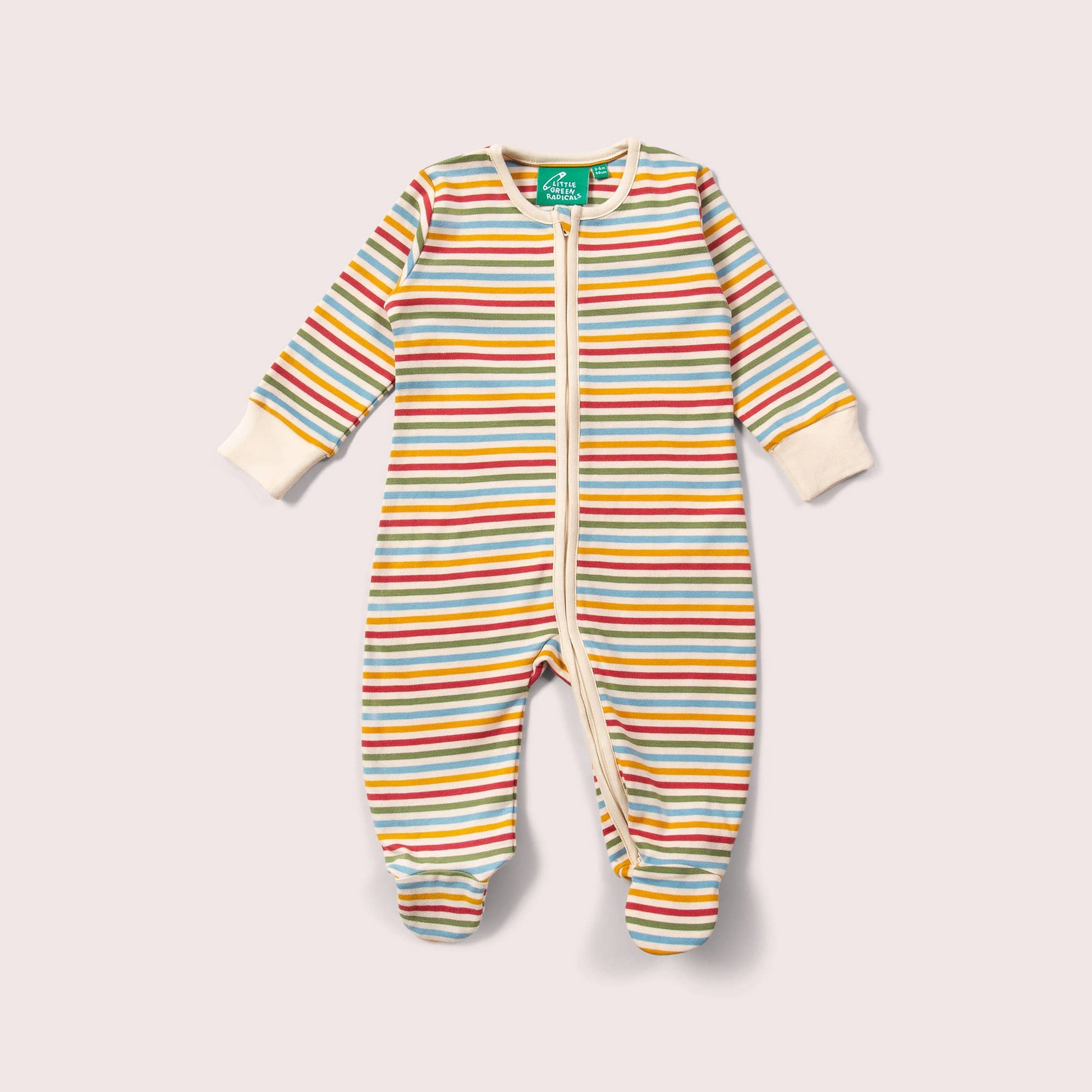 Striped baby romper with a cream and muted rainbow stripes a light gray background