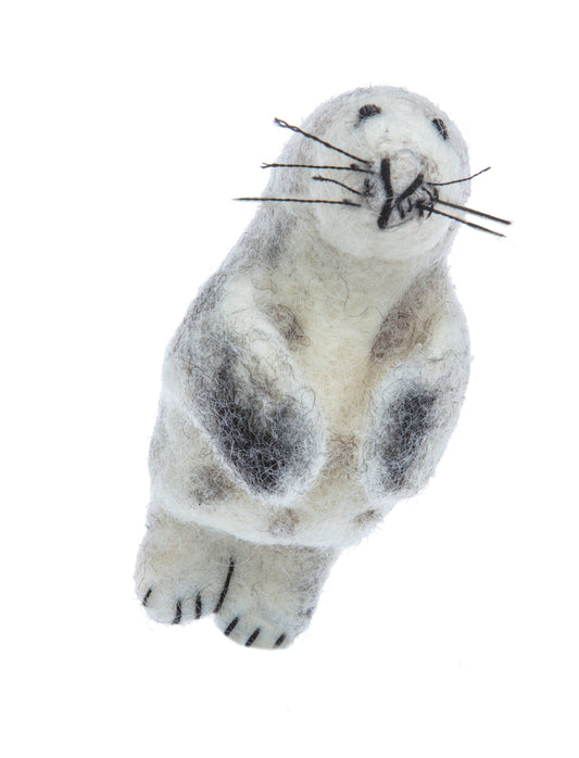 Stuffed toy seal on a white background
