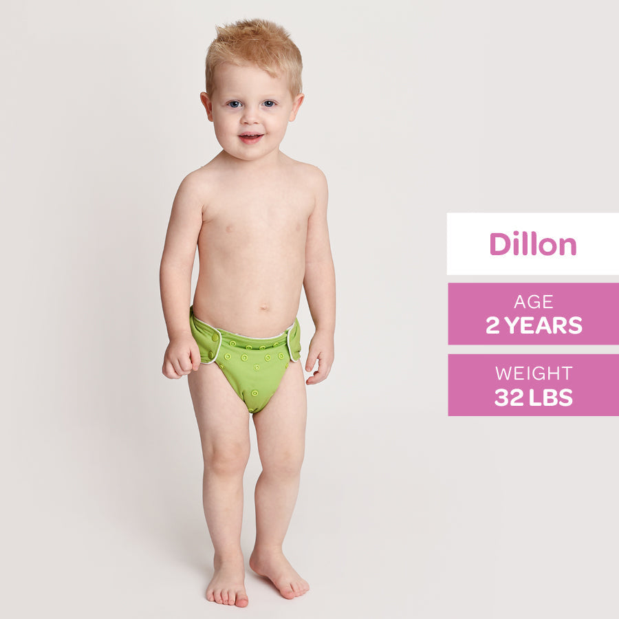 Child wearing green underwear with information about Dillon displayed on a light gray background