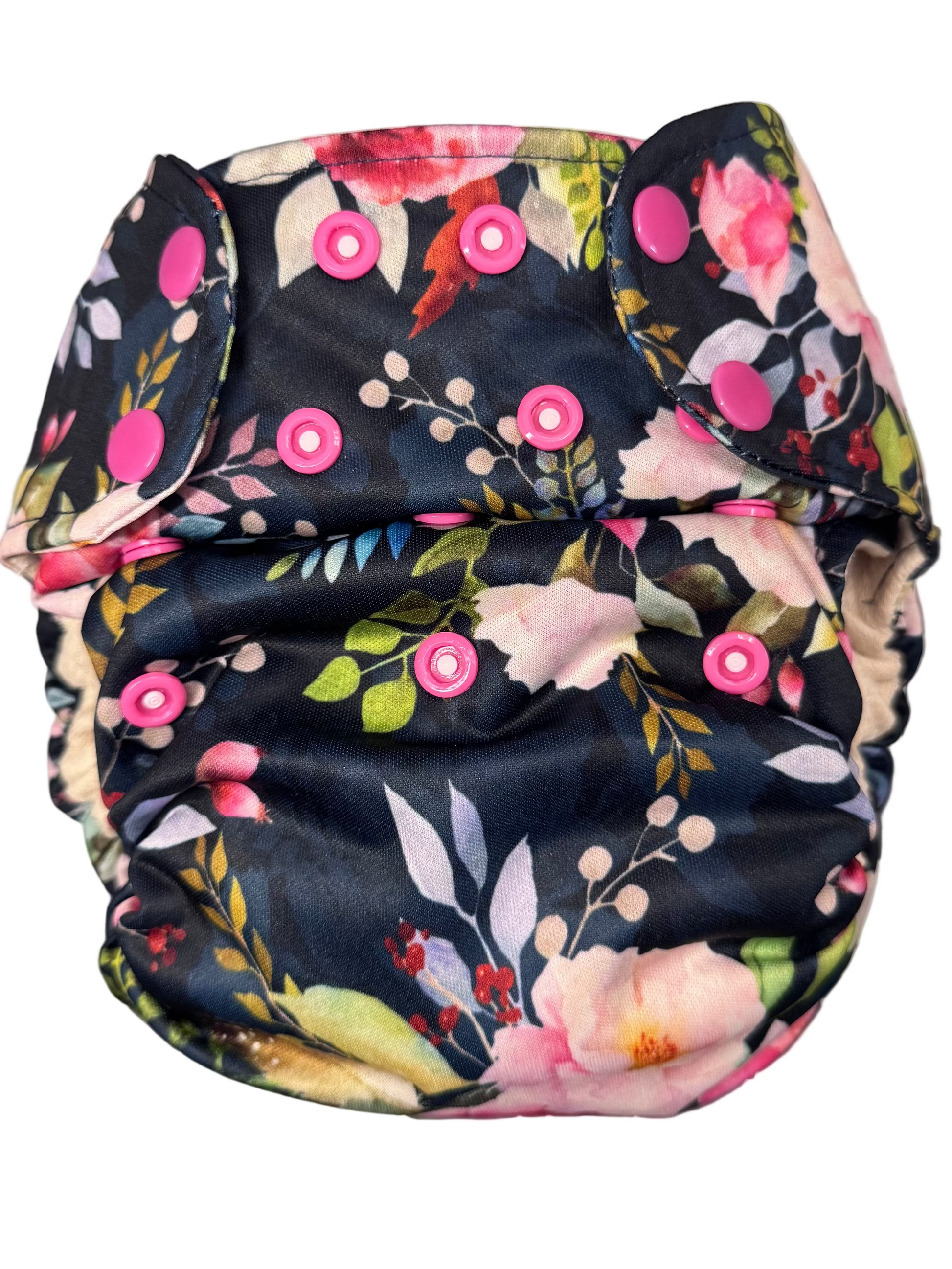 Floral-patterned diaper with pink buttons on a white background