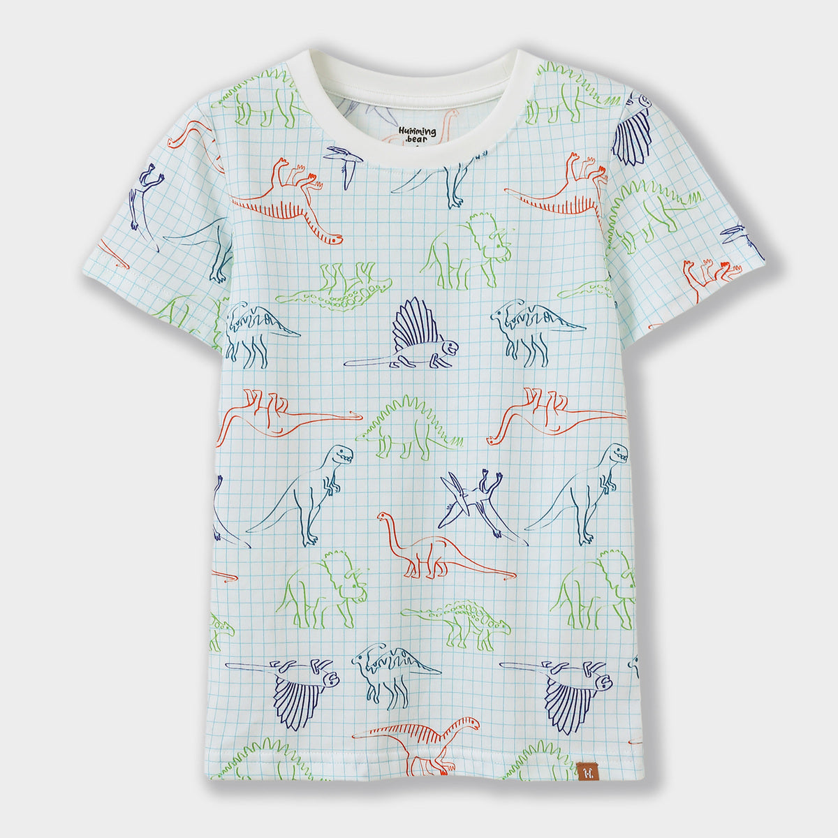 Children's t-shirt with dinosaur pattern on a light blue checkered background