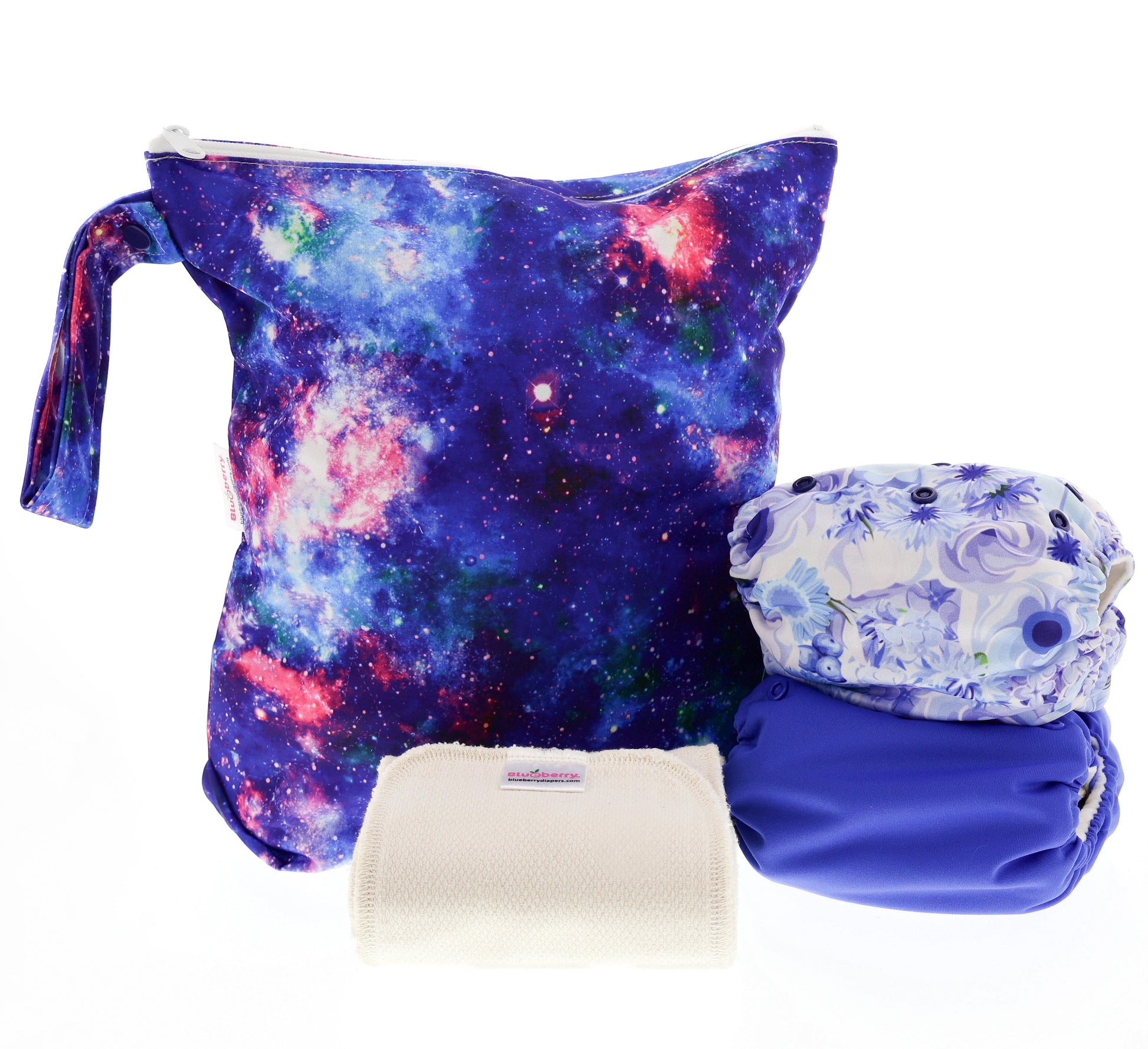 Set of reusable bags with galaxy pattern, floral design, and white pouch on a white background