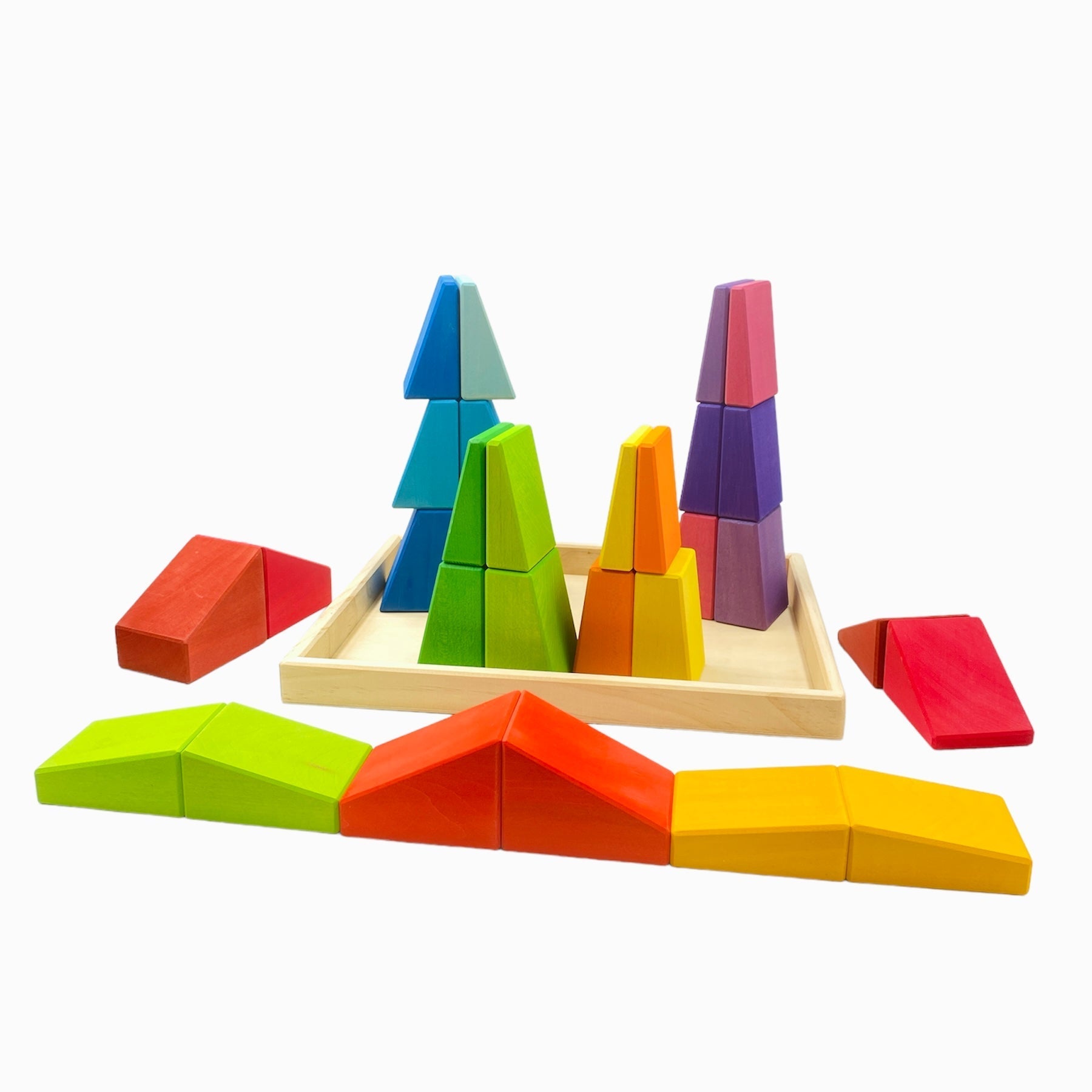 Colorful geometric wooden blocks on a white background