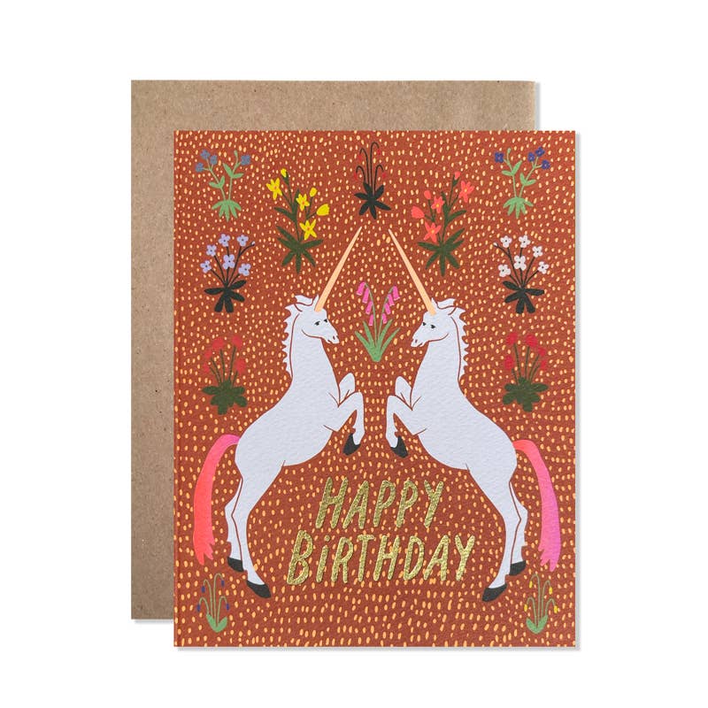 Birthday card with unicorns and flowers on a brown background