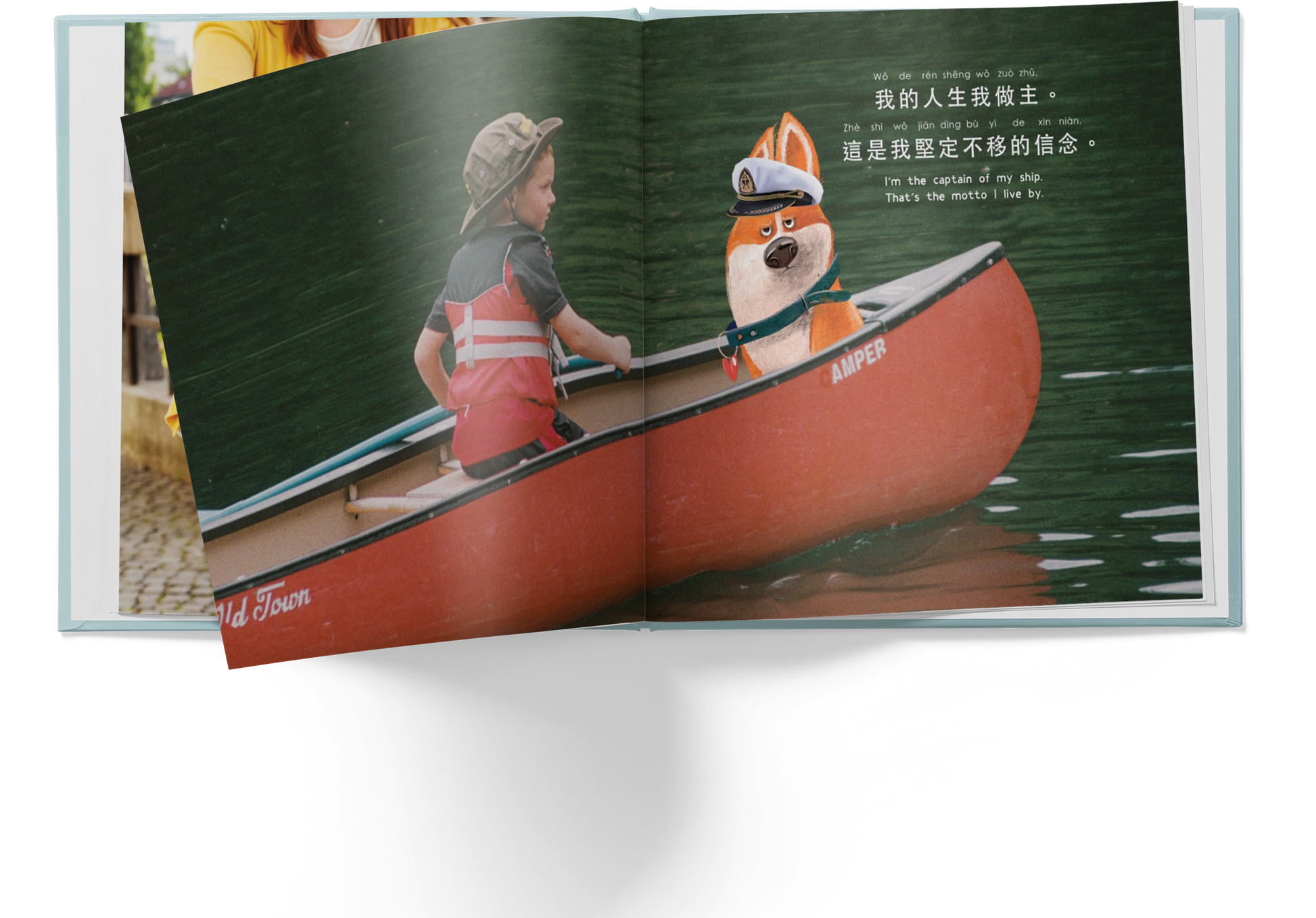 Open book showing a child and a dog in a red canoe with text on a green background.