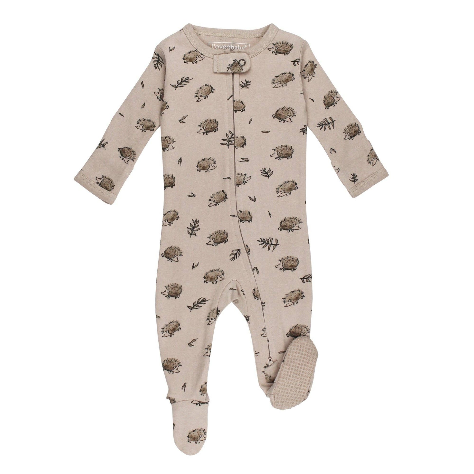 Baby footie with hedgehog pattern on a white background