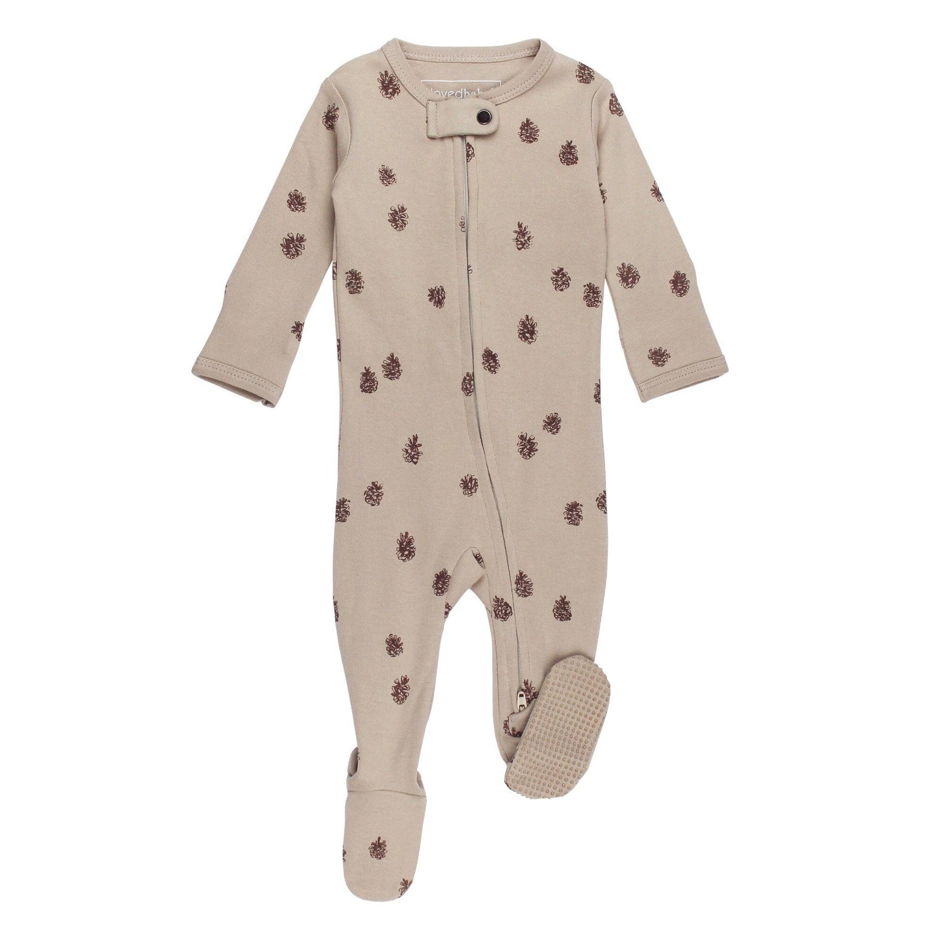 Beige baby footie with pine cone pattern on a white background