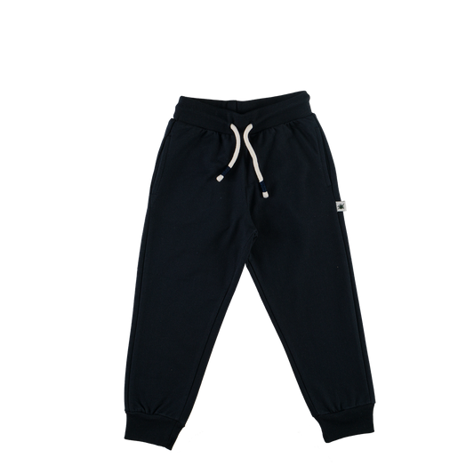 Black sweatpants with a white drawstring on a white background