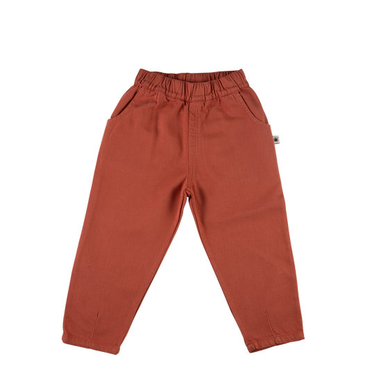 terracotta kids pants on a white background