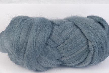 Wombat grey merino wool roving on a white background