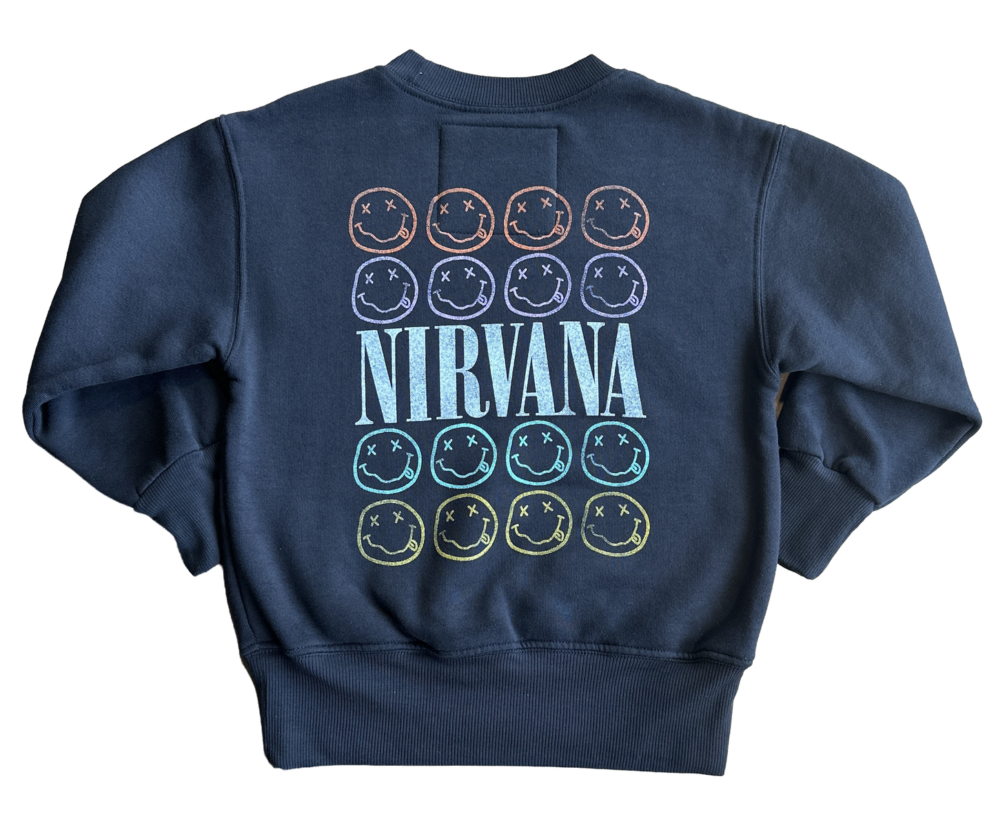Navy blue crewneck with colorful smiley face designs and 'NIRVANA' text on a white background