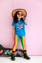 Load image into Gallery viewer, Child wearing a star hat, red sunglasses, rainbow striped pants and blue Wu-Tang Clan organic short sleeve tee
