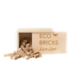 Bamboo eco-bricks box spilling pieces