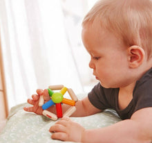 Load image into Gallery viewer, baby holding Color Carousel Wooden Clutching Toy
