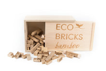 Load image into Gallery viewer, Eco-Bricks 250-piece box, opened with bricks spilling out of it

