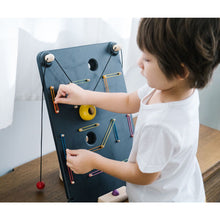 Load image into Gallery viewer, Kids Playing with A PlanToys Wall Ball Game
