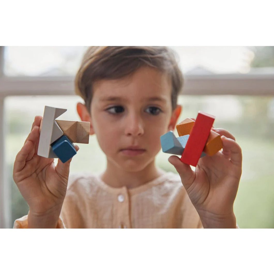 Child playing with PlanMini Rectangle Puzzle
