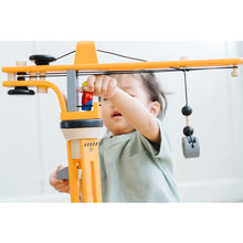 Load image into Gallery viewer, Child playing with Plan Toys Crane Set
