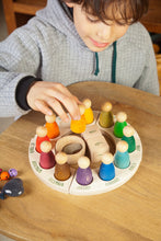 Load image into Gallery viewer, Child playing with Perpetual Calendar by Grapat
