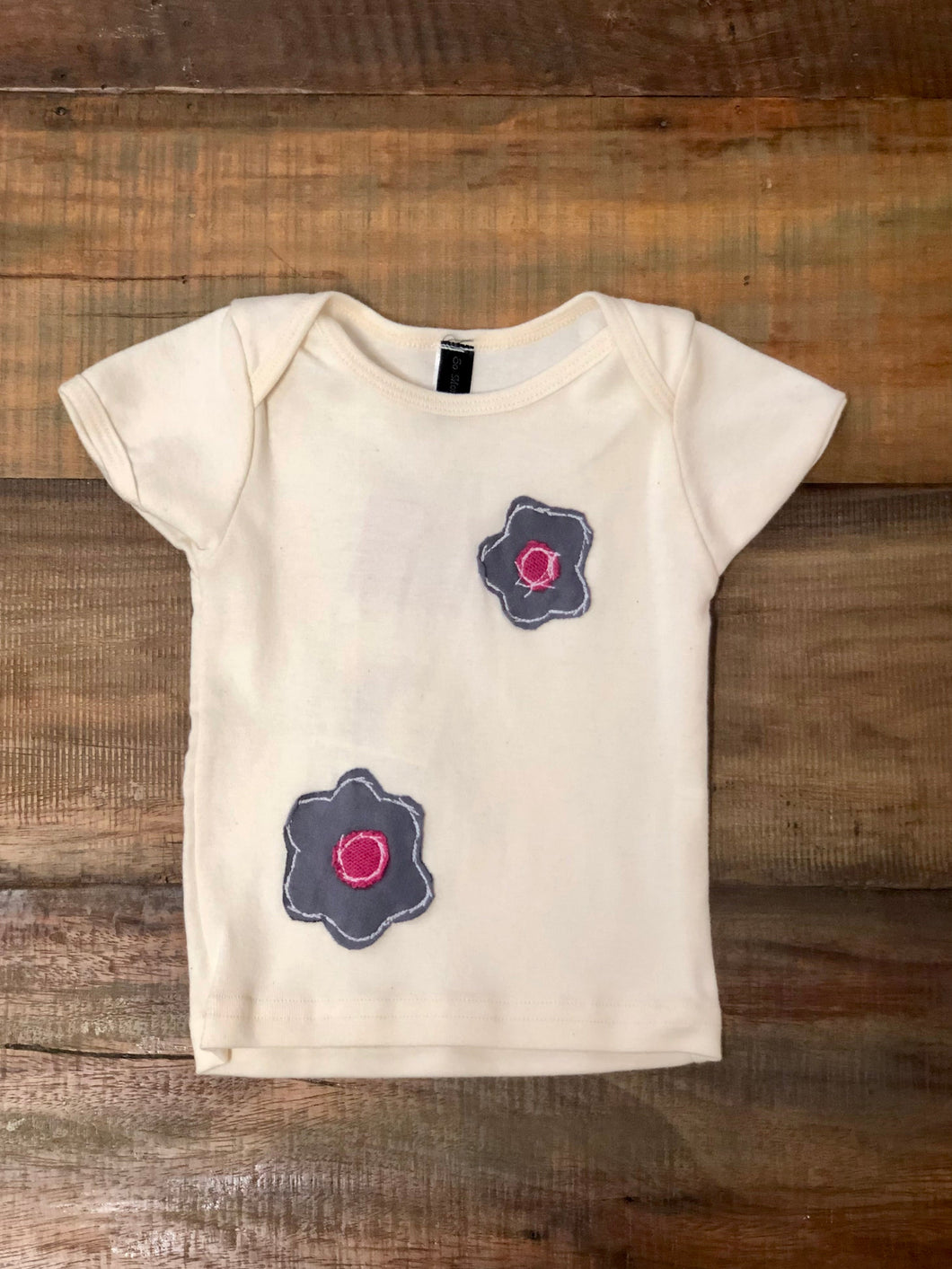 Flowers on a Natural Short Sleeve Baby Tee