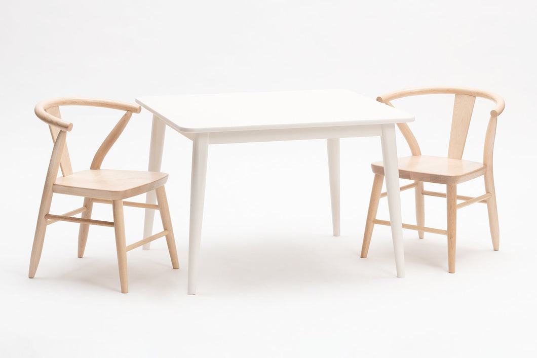 Natural crescent chairs by Milton and Goose with table