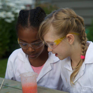 Children playing with Foundation Chemistry Kit: Beakers & Bubbles
