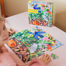 Load image into Gallery viewer, child building the Wild Things 64 piece puzzle at a table
