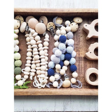 Load image into Gallery viewer, Whale Teether and crochet and wooden beads in a tray
