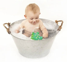 Load image into Gallery viewer, Baby in bath tin playing with rubber frog
