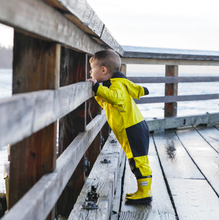 Load image into Gallery viewer, Kid in a yellow rain suit by Stonz
