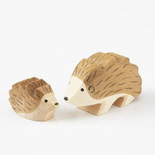 Load image into Gallery viewer, small and Large wooden hand carved Hedgehogs looking at each other on a white back ground
