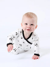 Load image into Gallery viewer, Baby crawling in an Organic Panda Print Footed Romper
