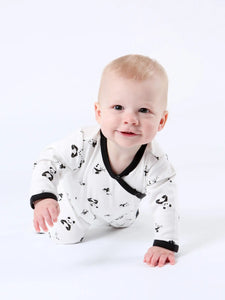 Baby crawling in an Organic Panda Print Footed Romper