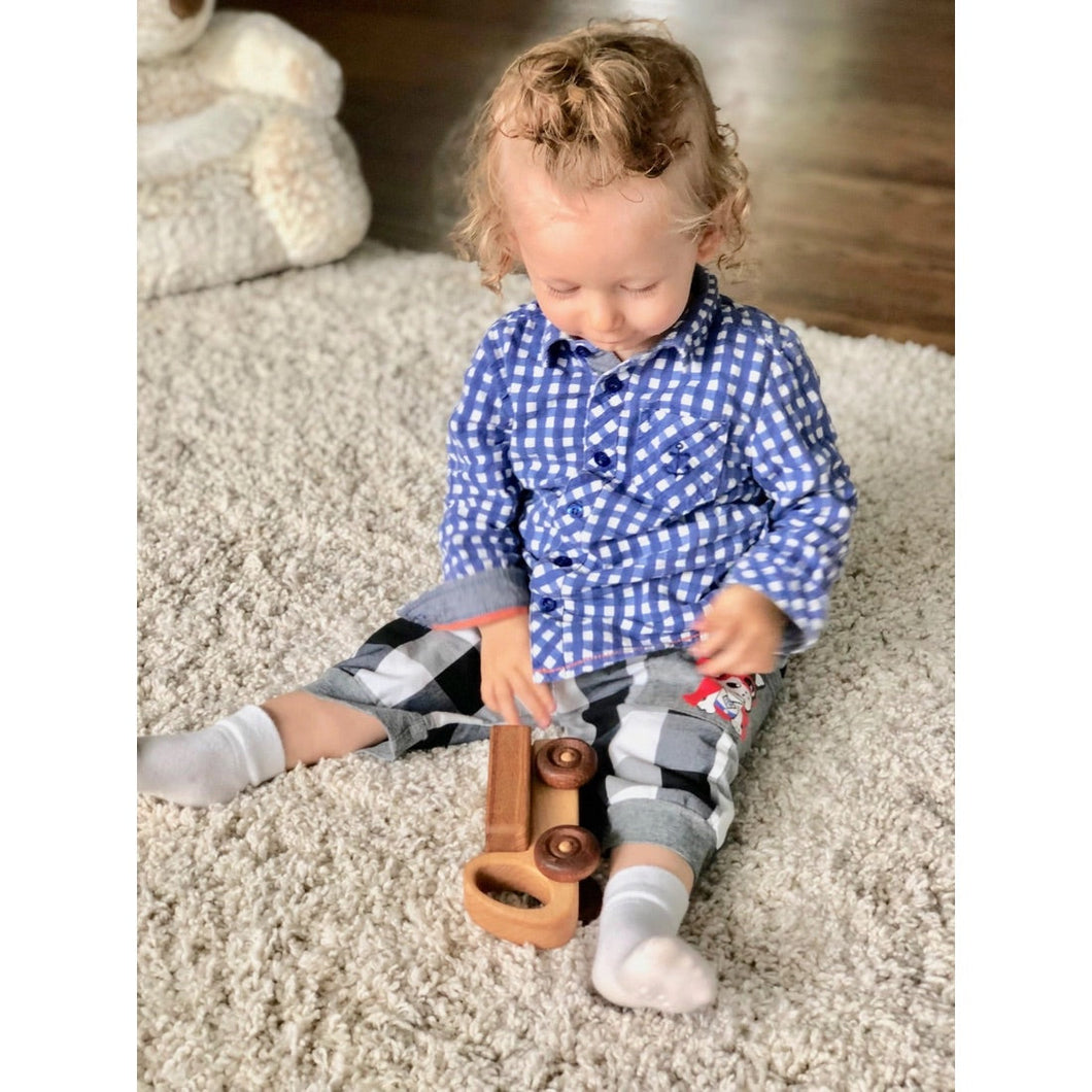 Wooden toy truck play