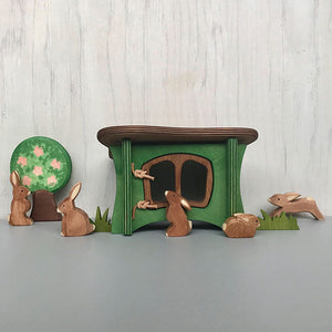 Rabbit/Geese Hutch with brown rabbits and an apple tree with blossoms by Ostheimer toys