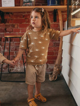 Load image into Gallery viewer, Child wearing a Golden Sun Organic Short-Sleeve Tee
