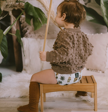 Load image into Gallery viewer, baby in plants cloth diaper
