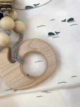 Load image into Gallery viewer, Whale Short Sleeve Bodysuit close up with wooden whale teether
